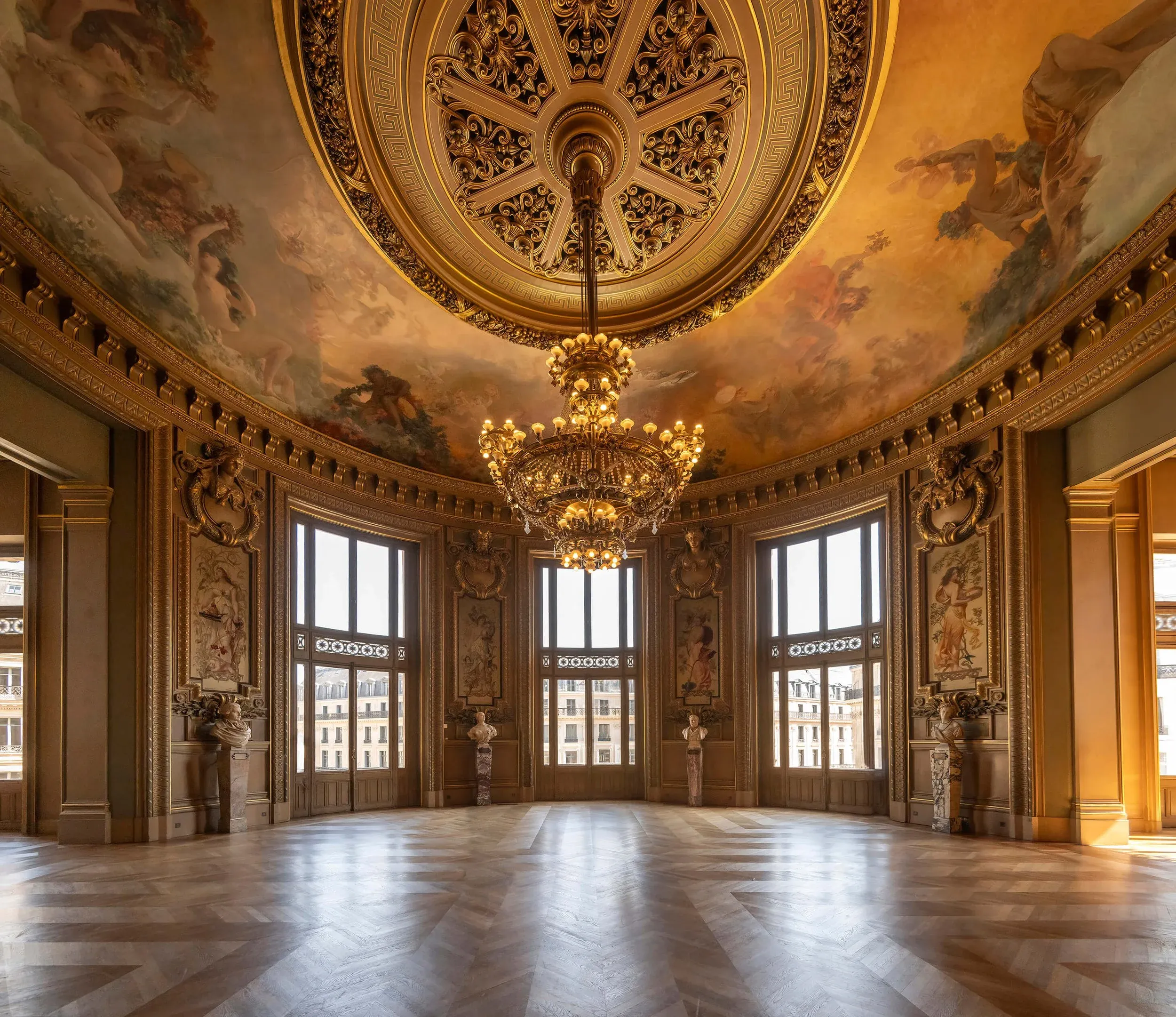Palais Garnier grand foyer with gilded ornament and chandeliers