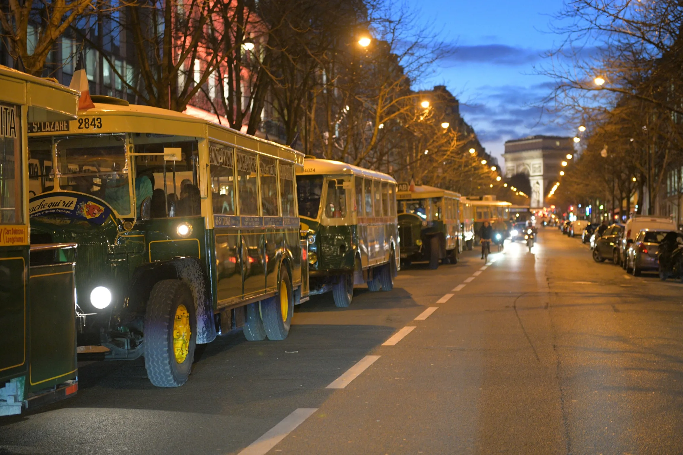 Historic bus parade on Champs-Élysées