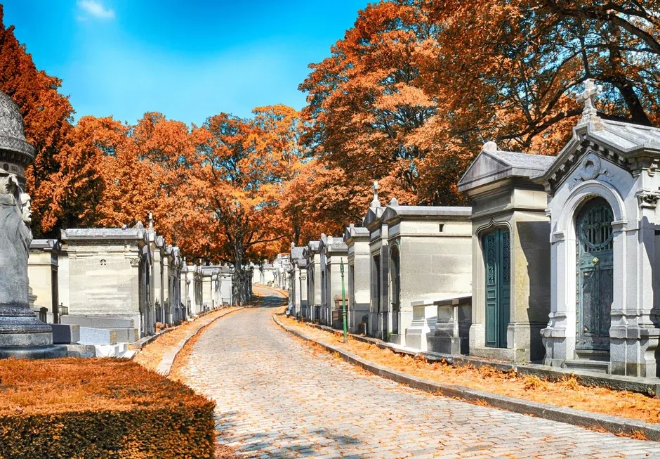 Autumn leaves over historic tombs