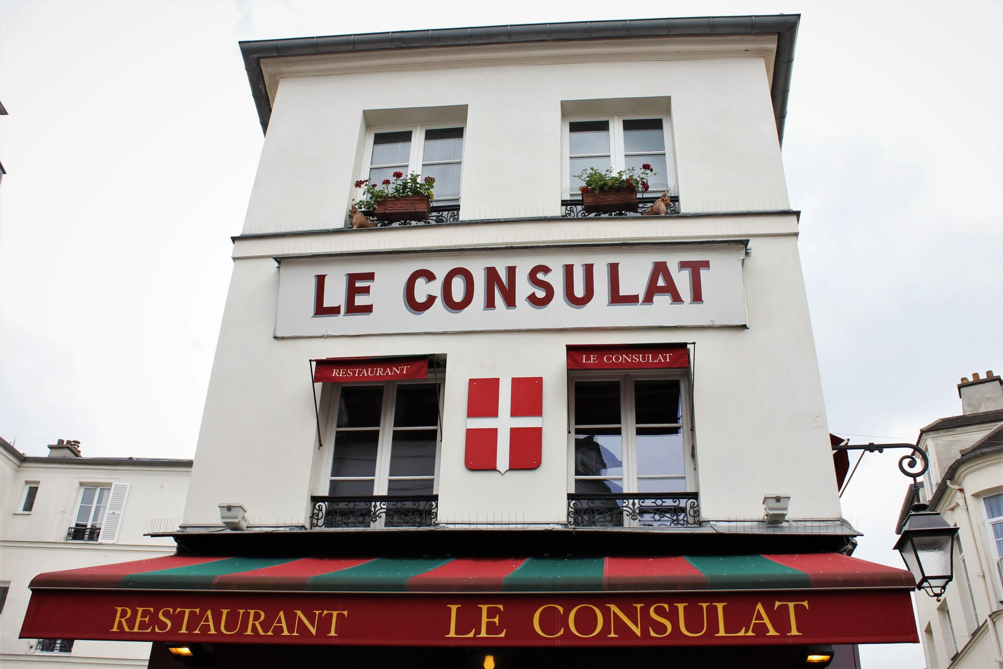 Le Consulat cafe on a sunny day in Montmartre