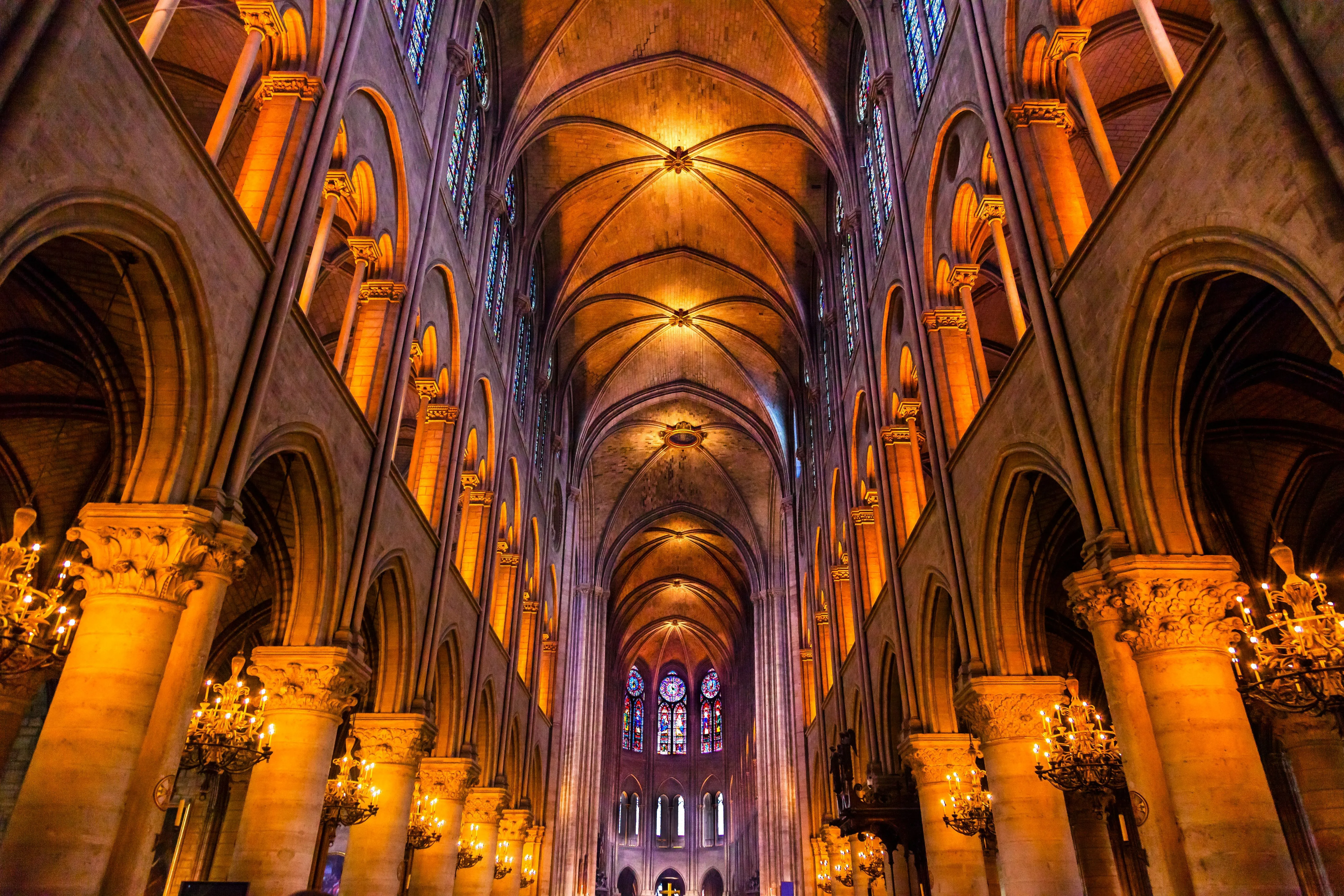 Notre‑Dame main nave with warm lights