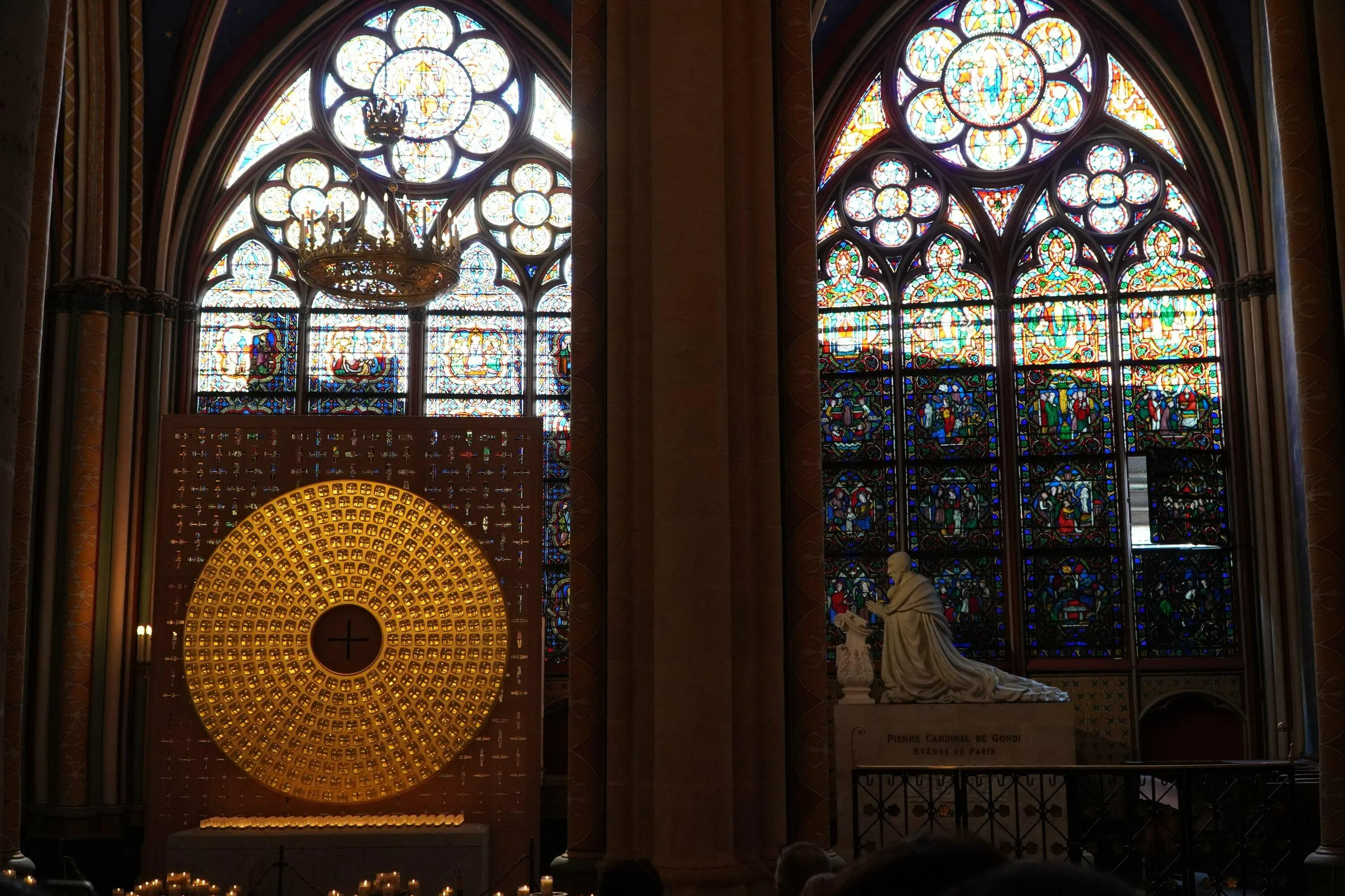Stained glass detail with golden plaque inside the cathedral