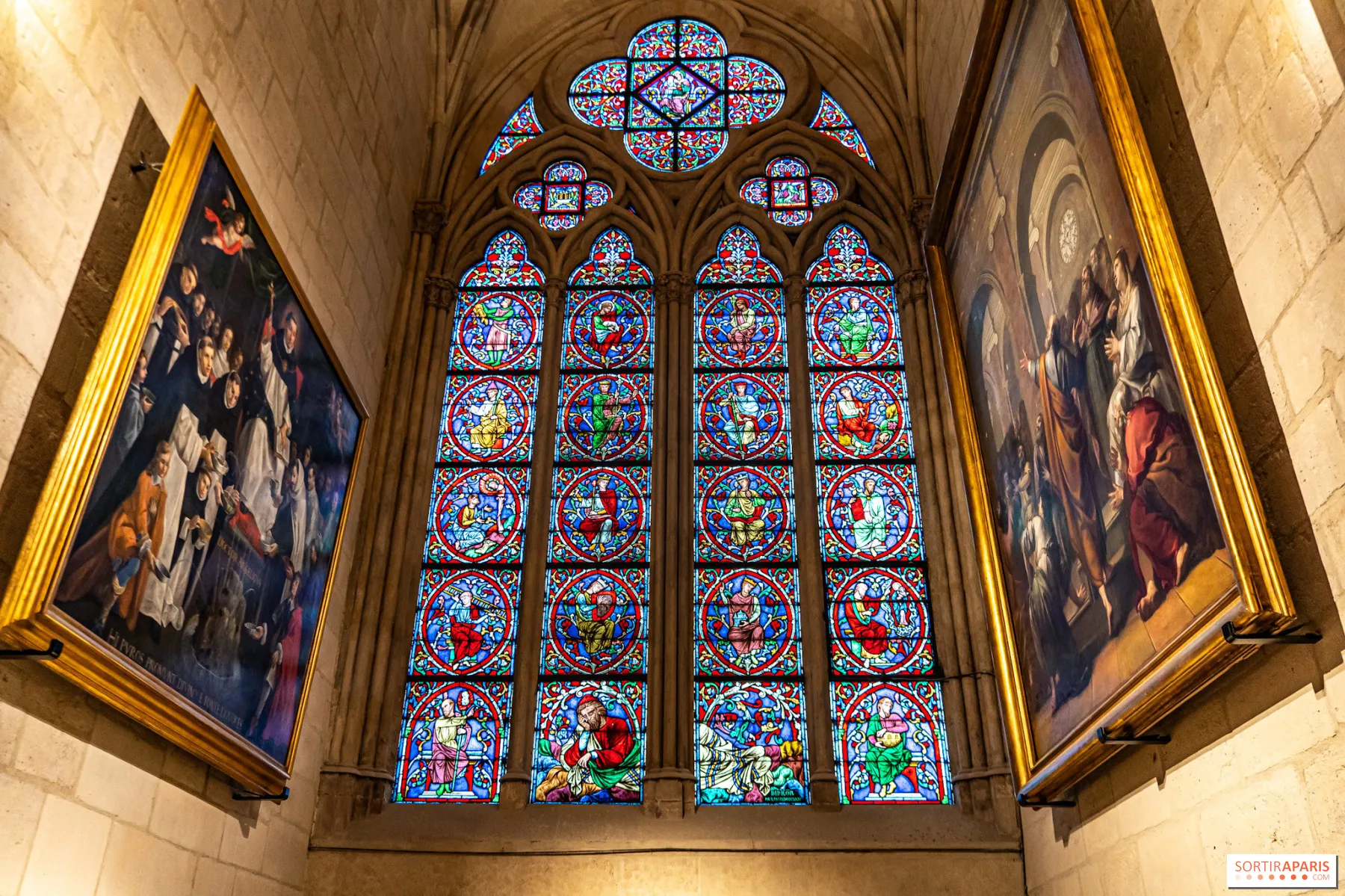 Notre‑Dame stained glass with twin painted panels