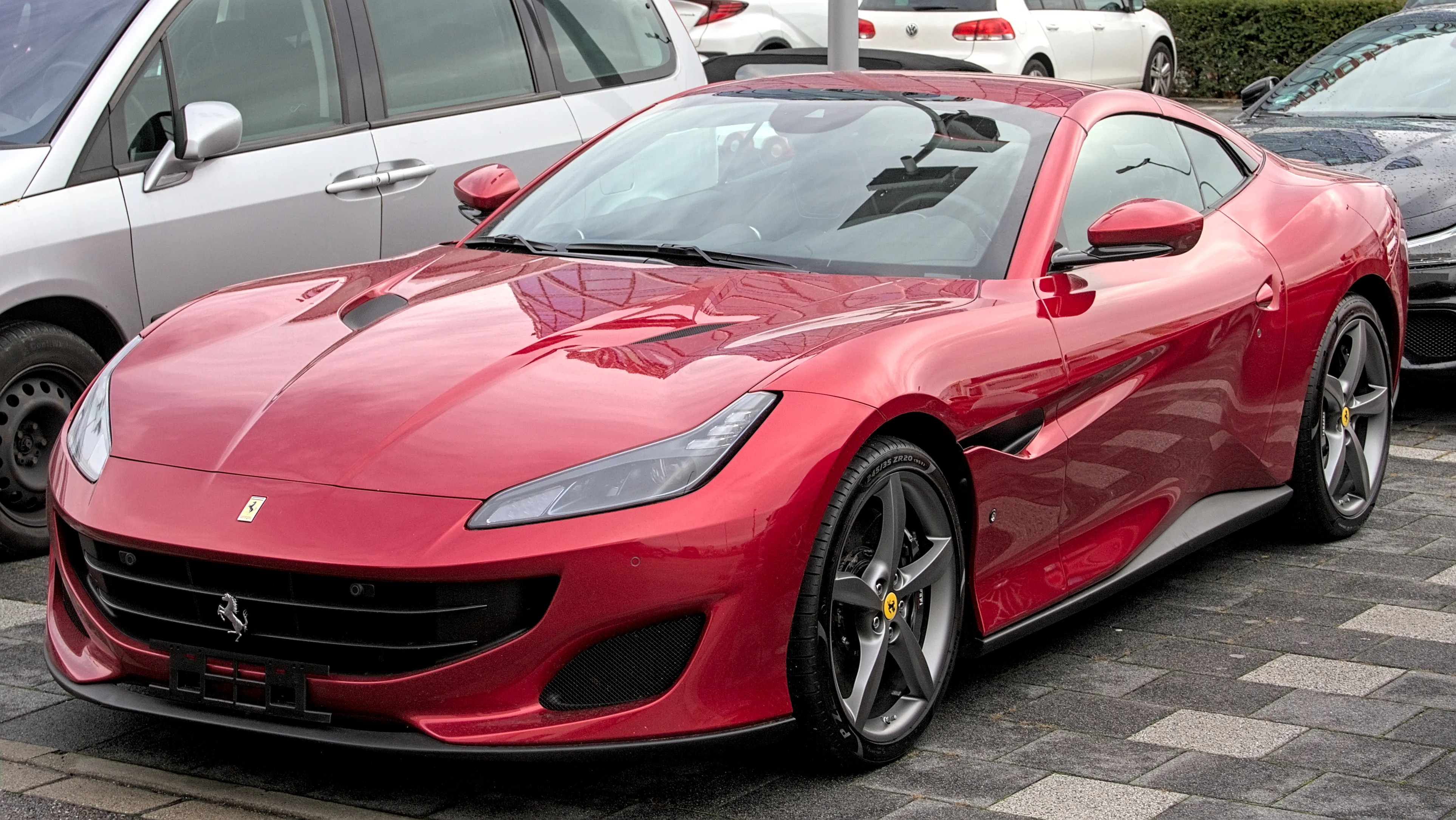 Portofino Cultural Icons: Songs, Cars, and Nightlife Ferrari Portofino representing lifestyle symbolism