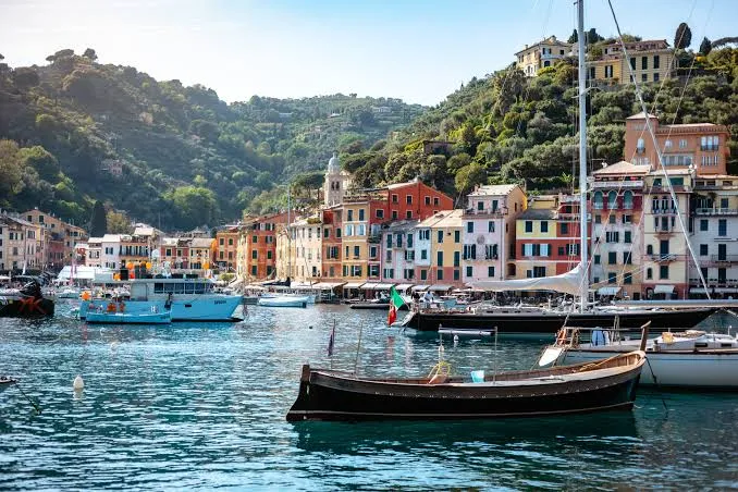 Portofino Harbor Guide: Traditional Boats and Yacht Culture Traditional old Ligurian gozzo boat