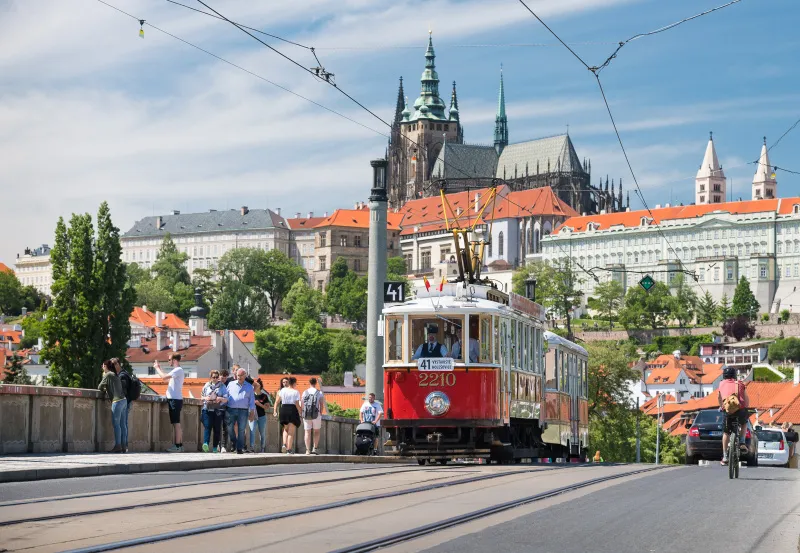 Vintage tram with Prague Castle view