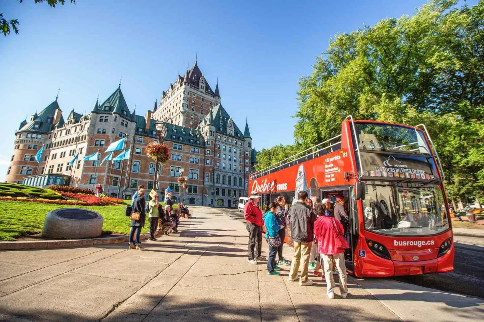 Sightseeing bus paused at a central Quebec City stop