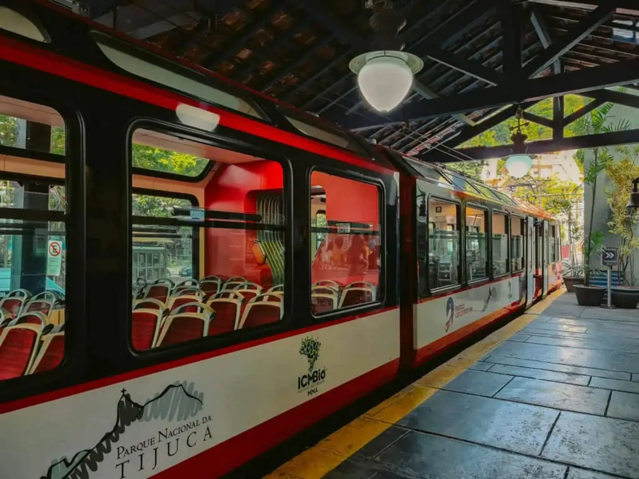 Corcovado train station entrance surrounded by greenery