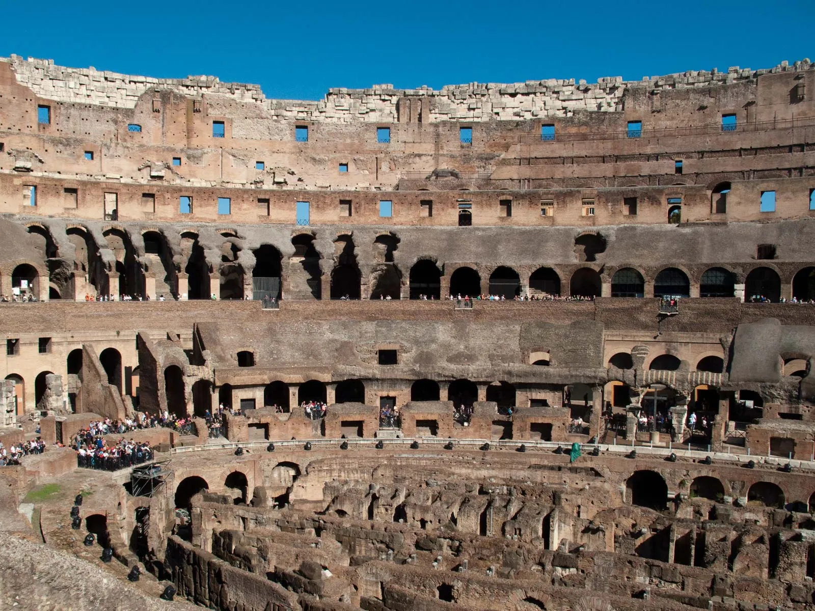 Interior arches and seating tiers inside the Colosseum