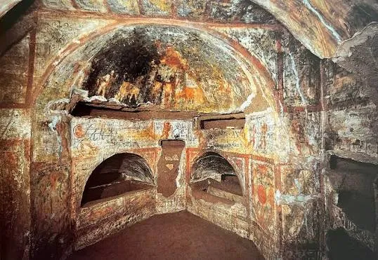 Ancient fresco details inside the Catacombs of Domitilla