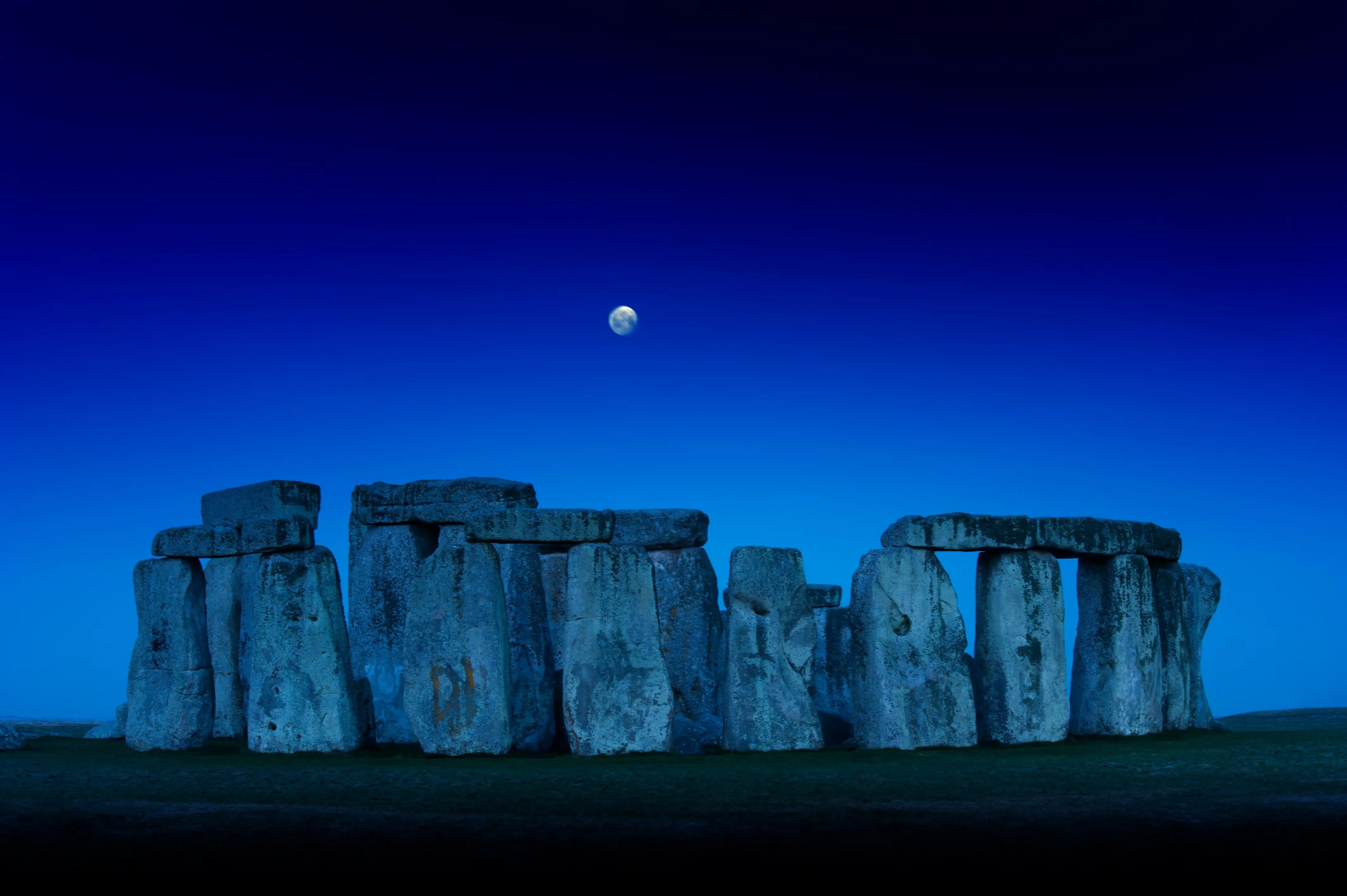 Stonehenge under the night sky and legends