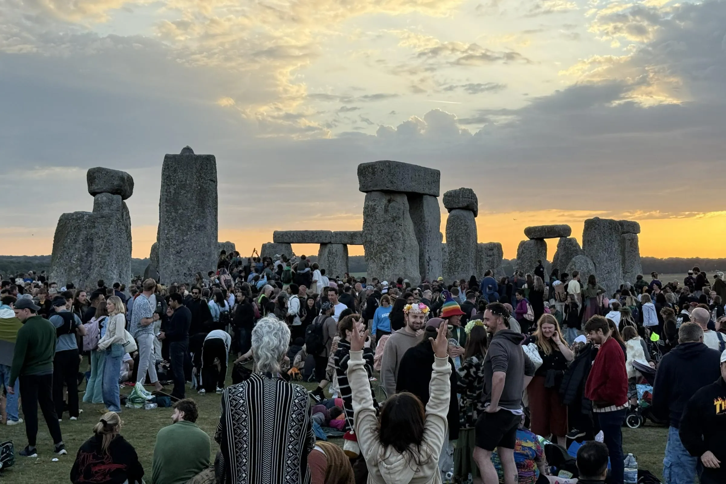 Sun rising through Stonehenge alignment at solstice