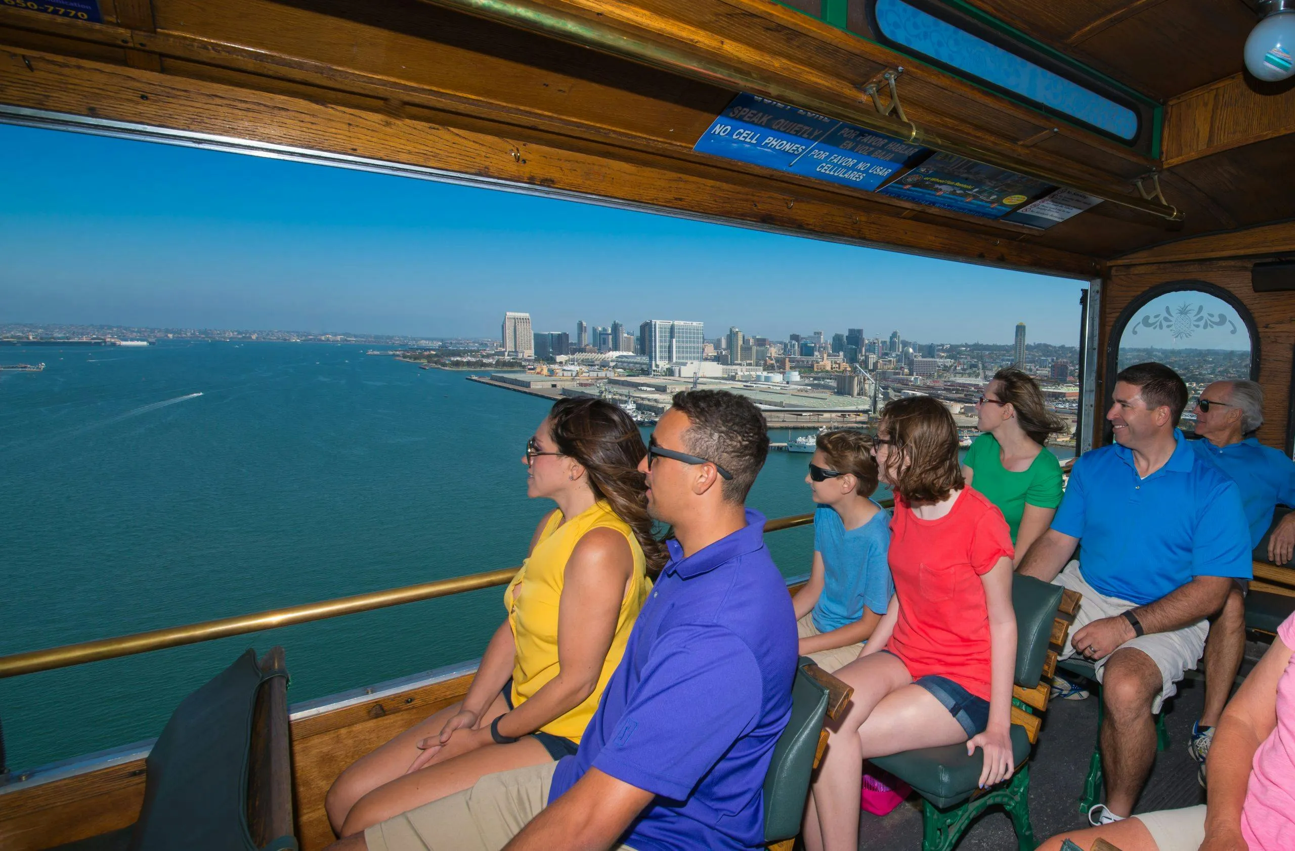 Happy tourists on the Old Town Trolley in San Diego
