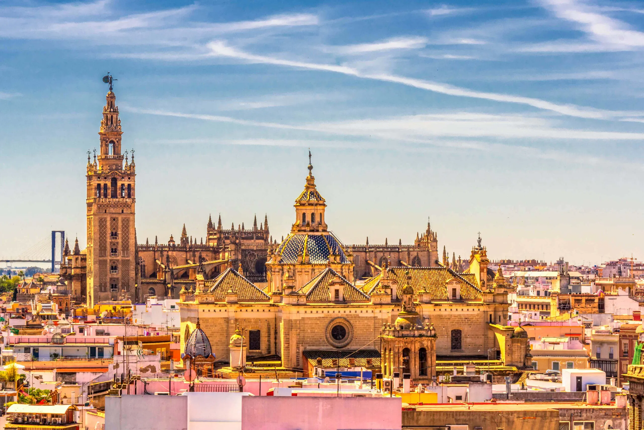Wide view of Seville Cathedral and surrounding skyline