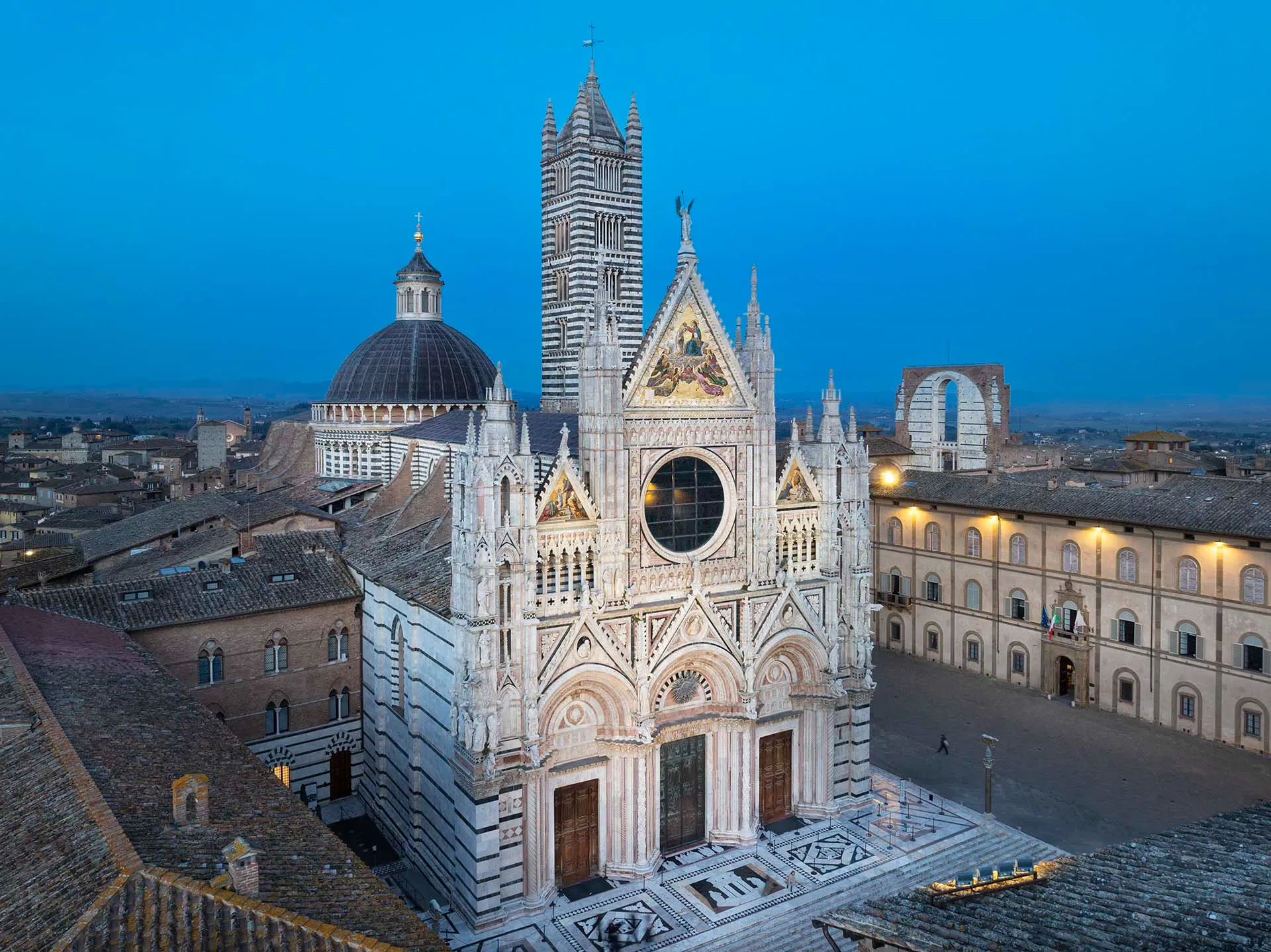 Aerial view of Siena Cathedral at dusk