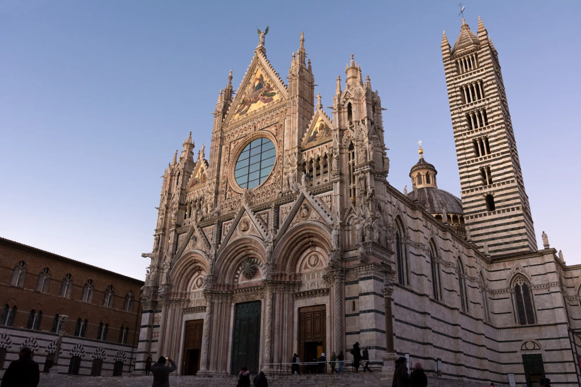 Siena Cathedral facade at dusk