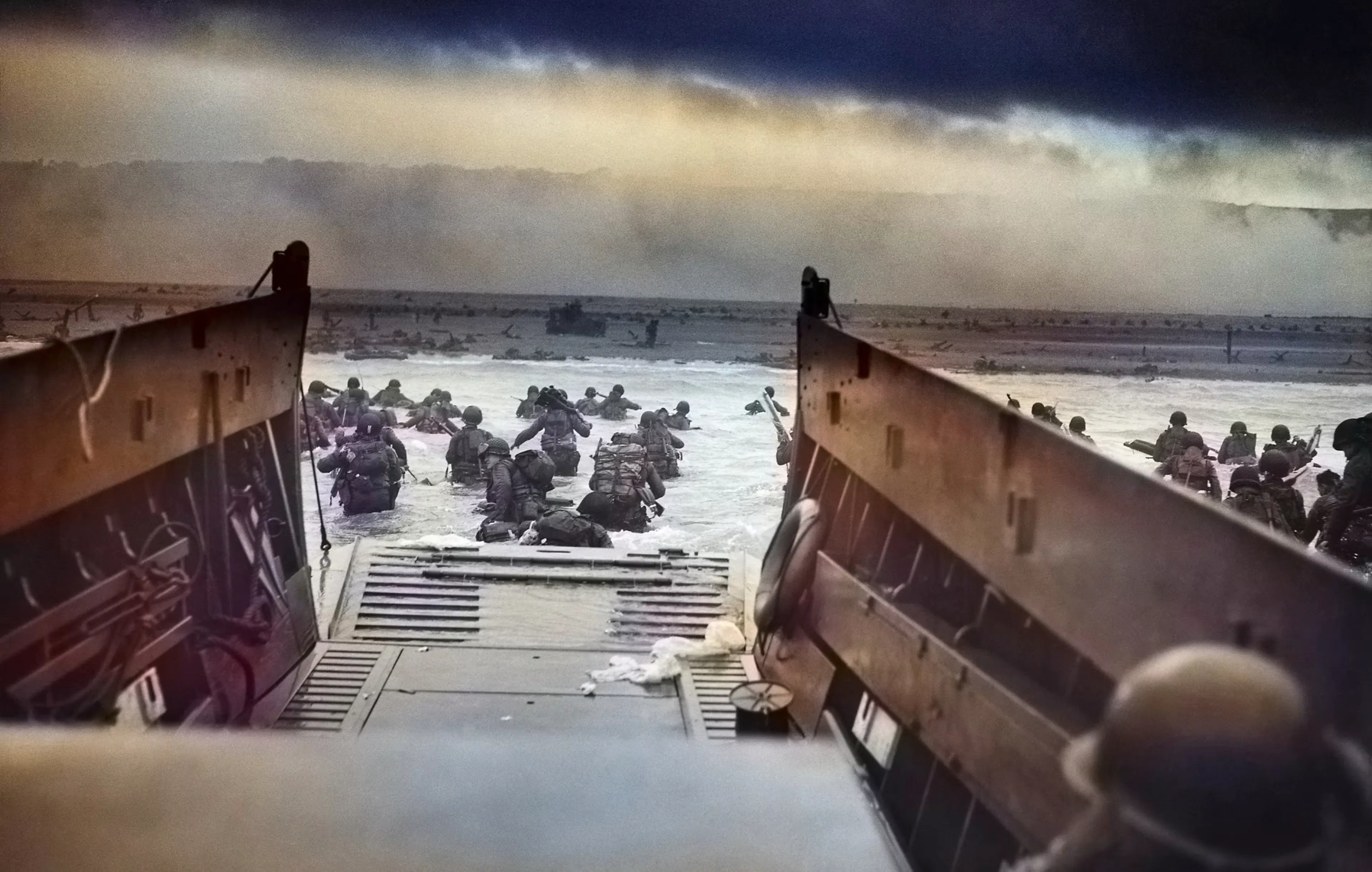 Allied soldiers moving inland after the beach landings