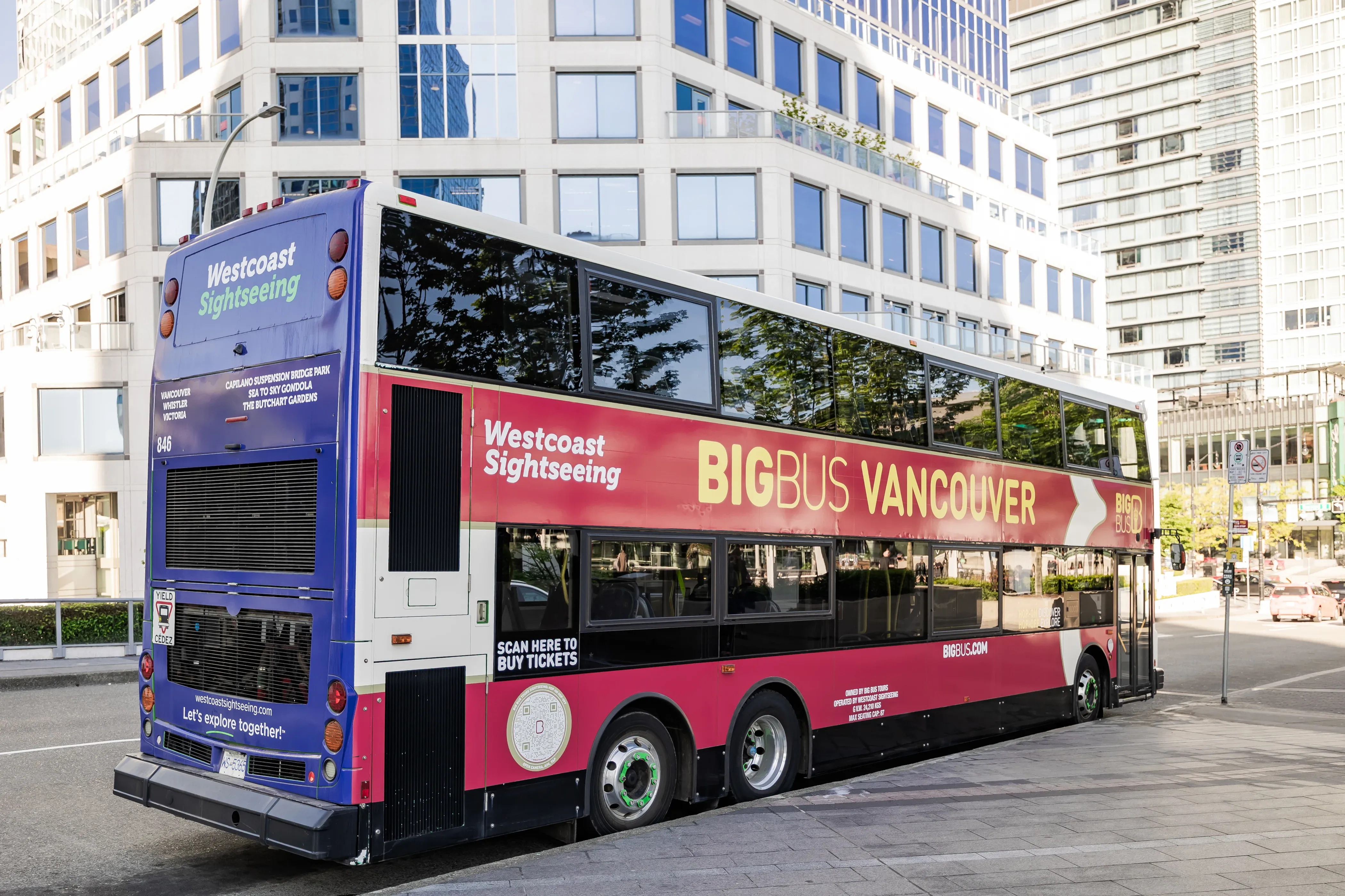 Open-top tour bus near the waterfront