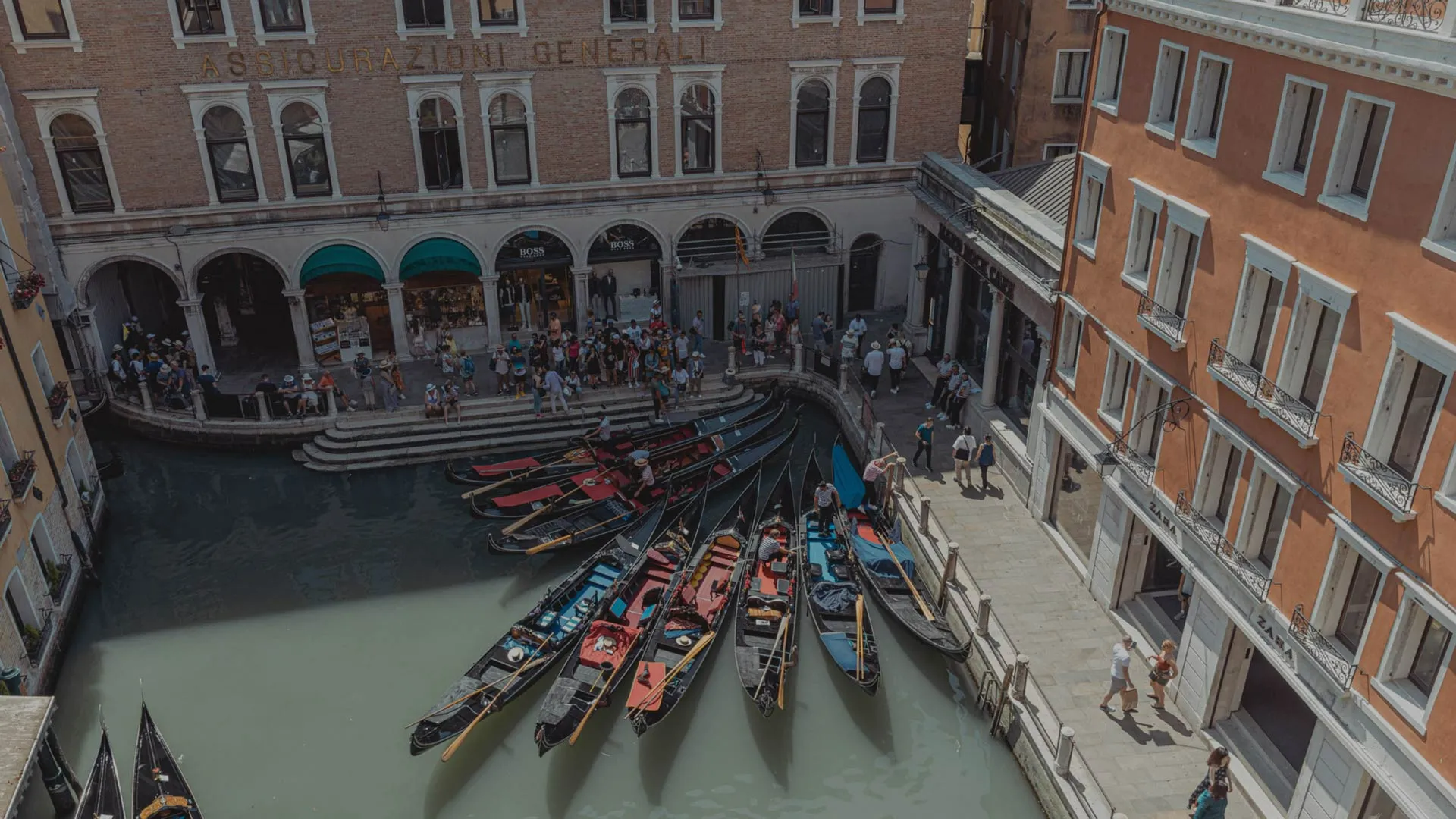Docked gondolas by the lagoon