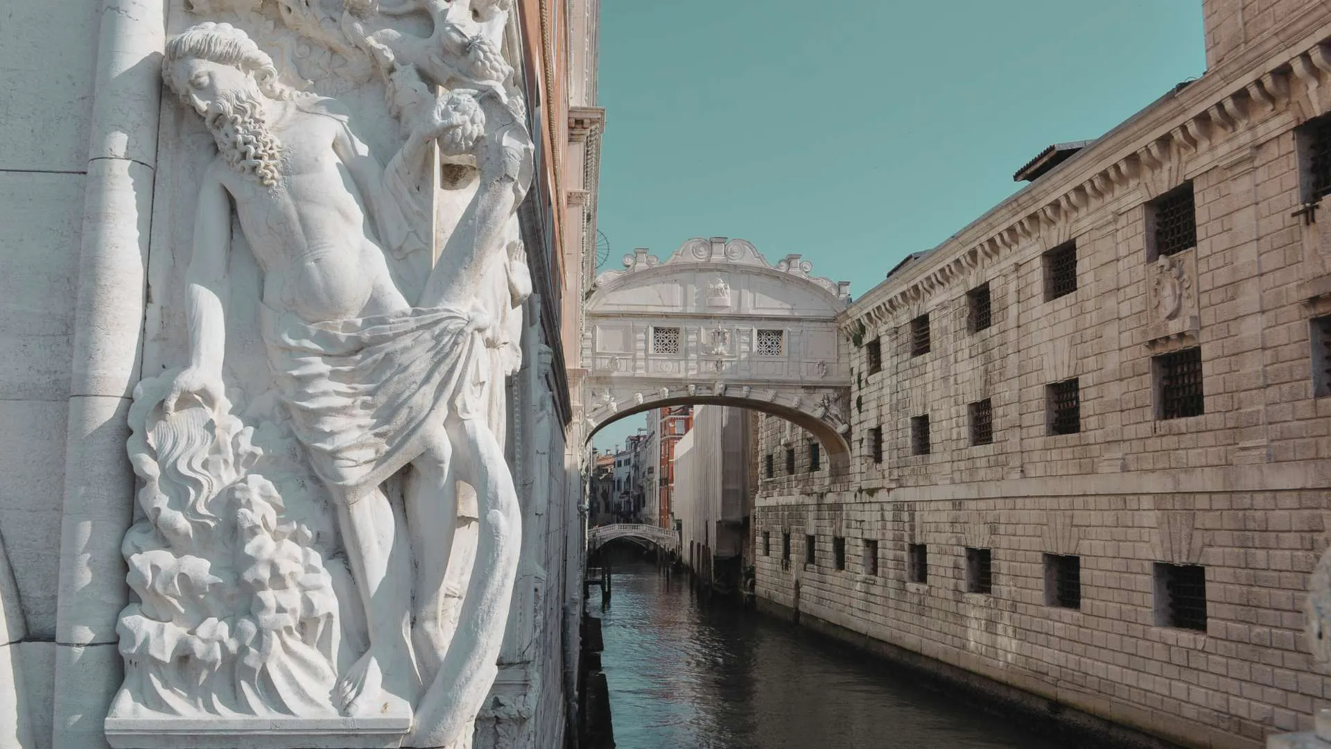 Close-up of ornate stonework near the Bridge of Sighs corner
