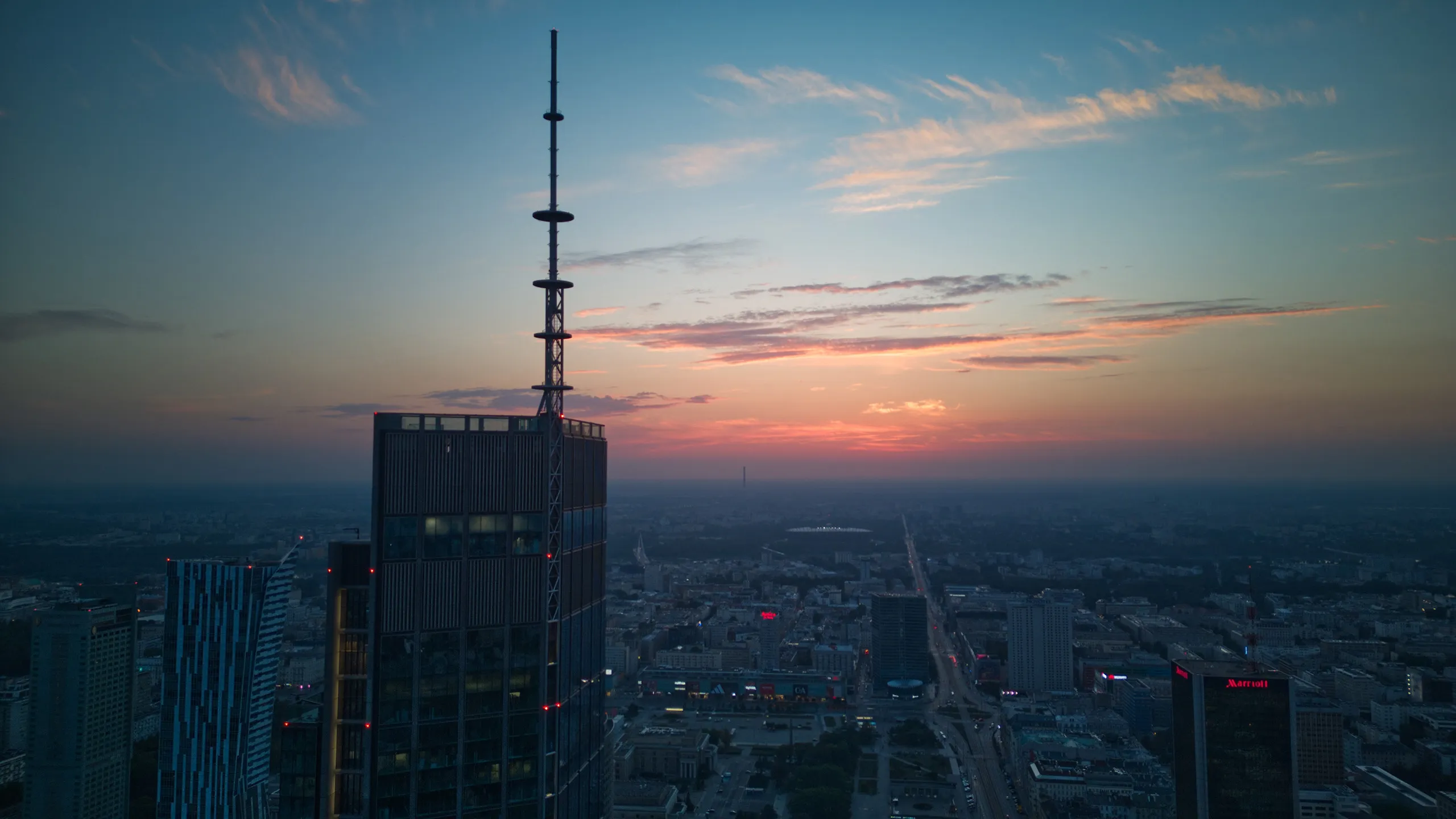 Golden hour skyline from the rooftop deck