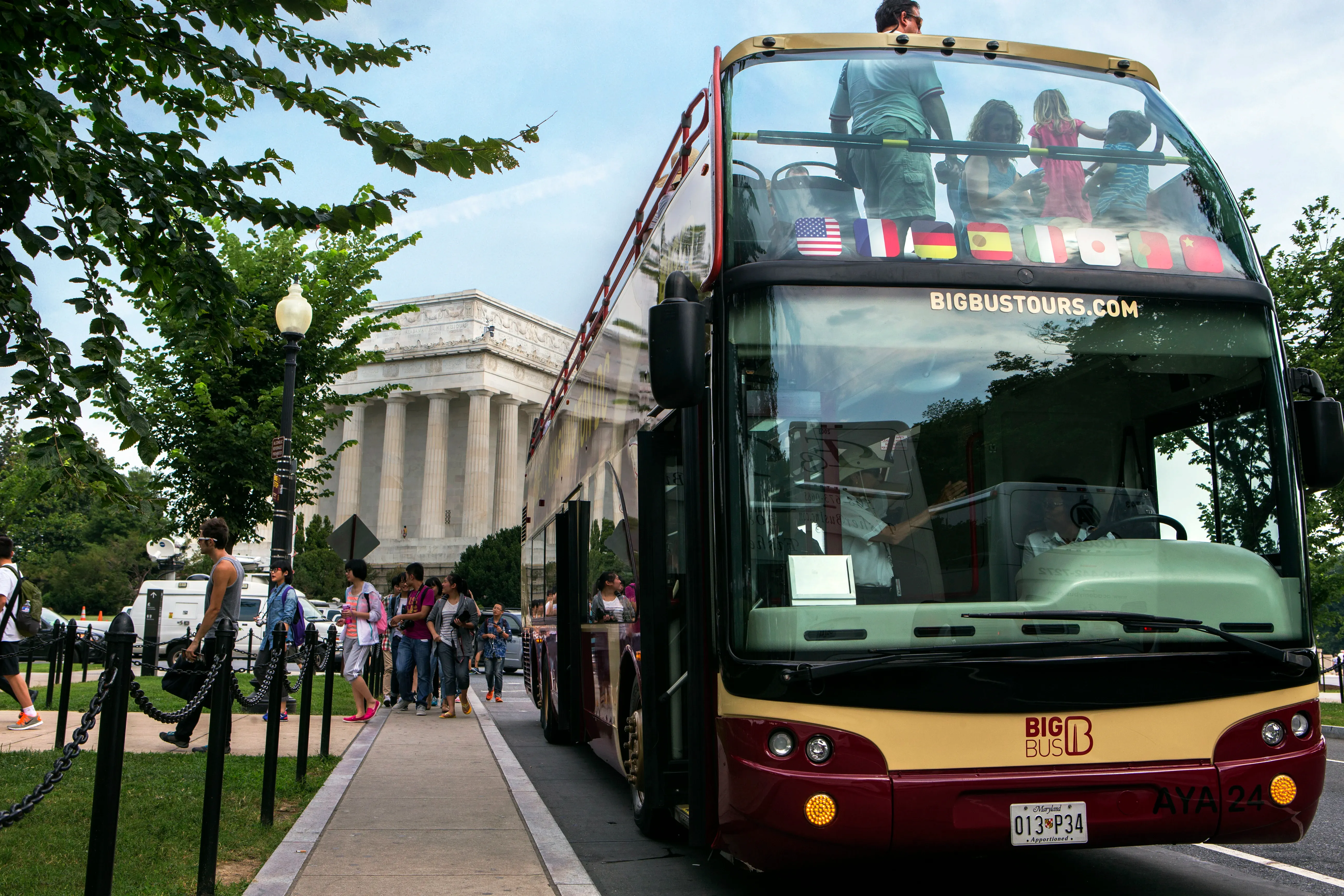 Hop-on hop-off stop with passengers boarding